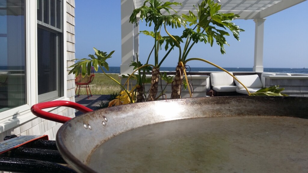 Outdoor patio with a large cooking pan.