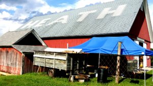 Red barn with "HEATH" on the roof.