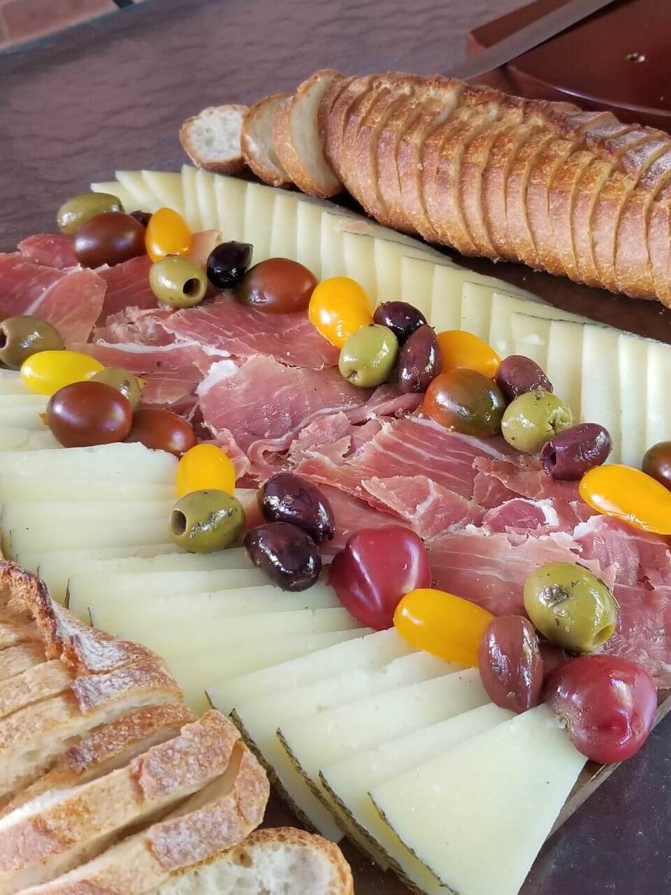 Cheese, cold cuts, tomatoes, and bread