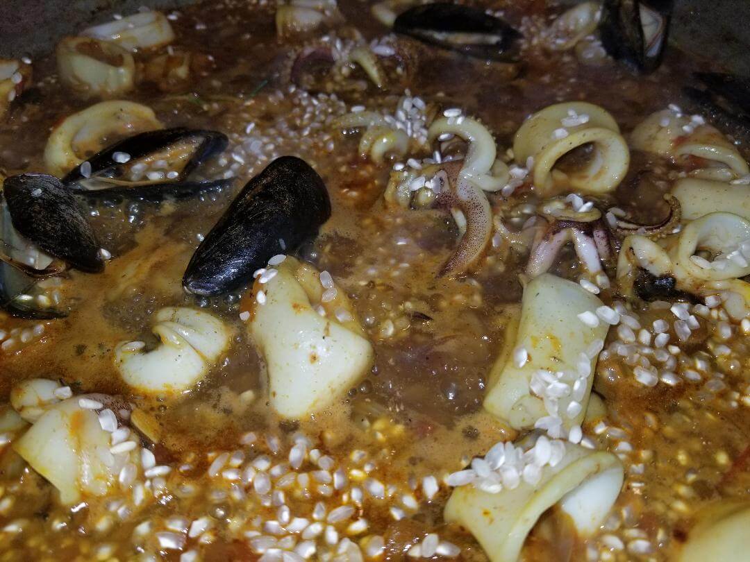 Closeup shot of Paella dish with seafood
