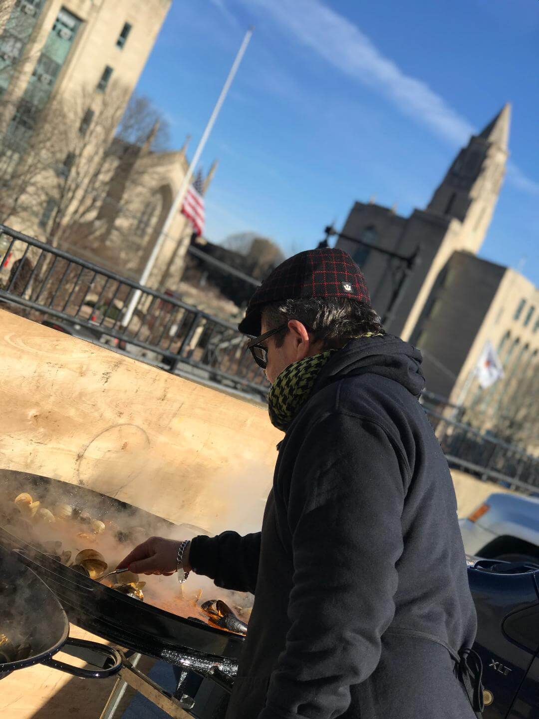 A man Cooking at the Boston University Christmas Party