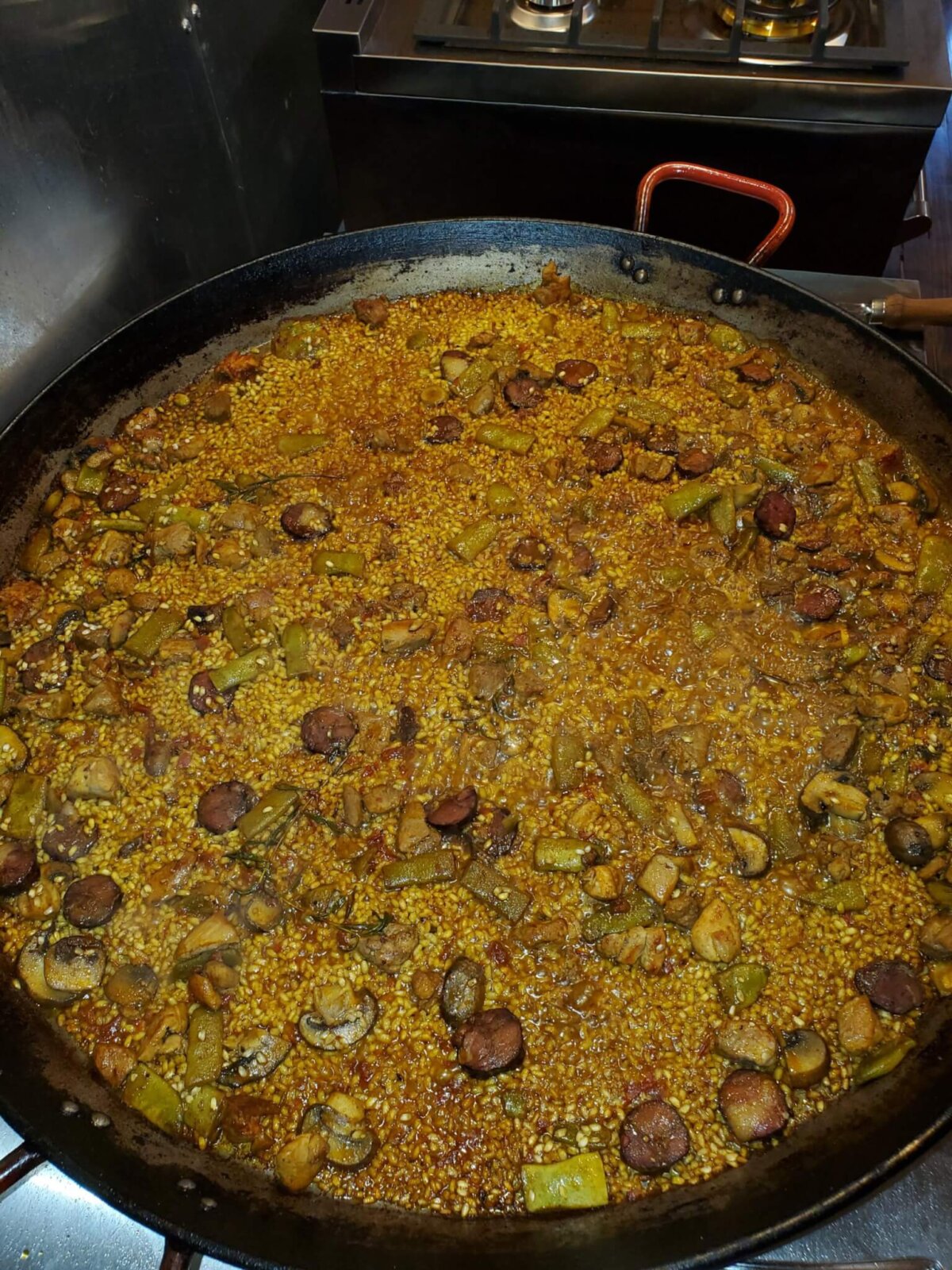 a pan full of delicious Paella with veggies
